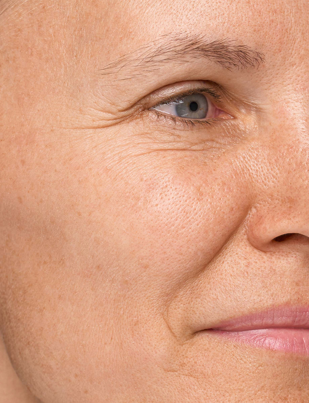 Close-up of a person's eye with visible skin texture