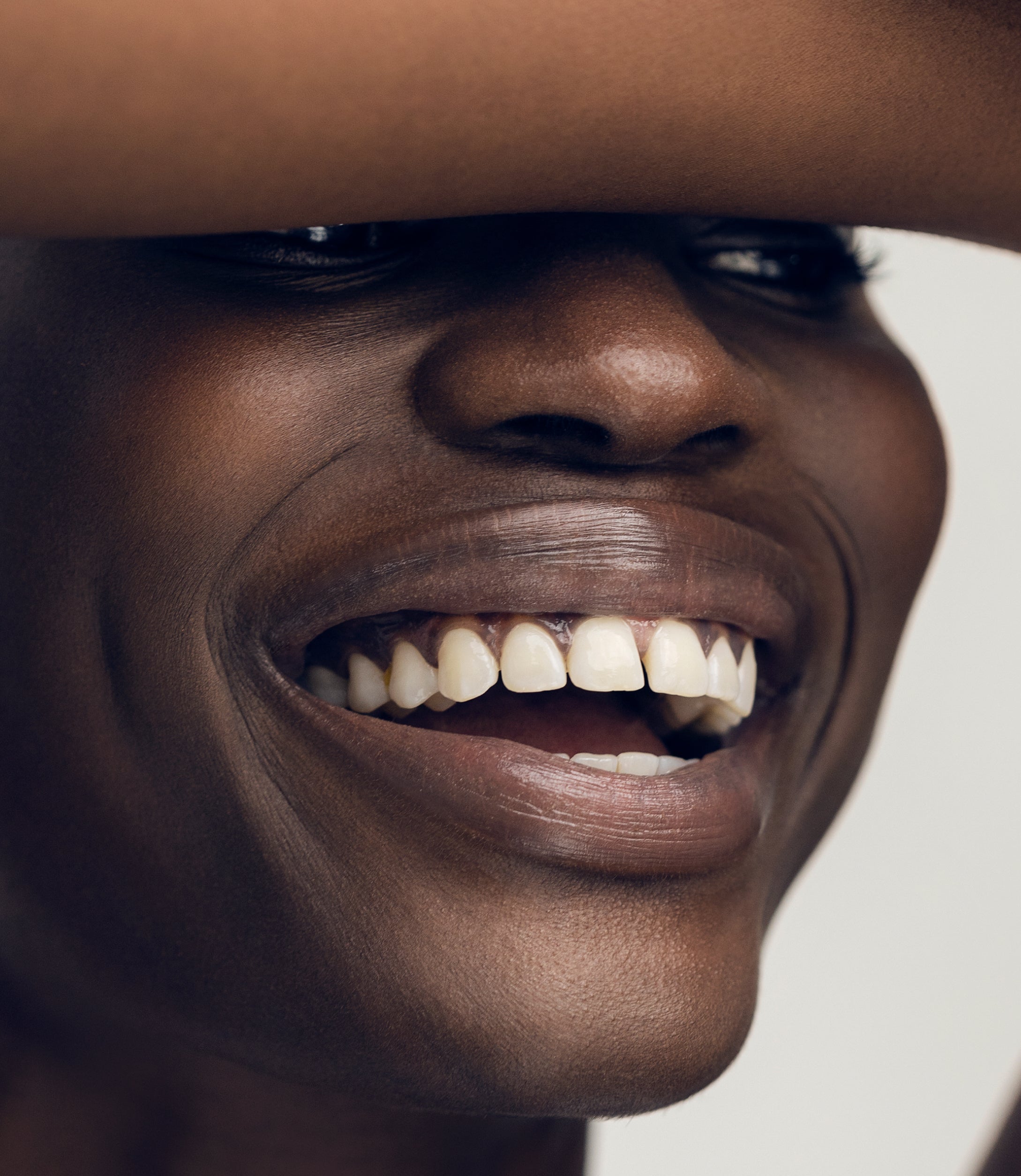 Close-up of a person's face with a focus on plumping and repairing lips.